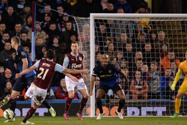 George scored nine goals in the top flight, the most famous for Burnley in a 1-0 win over Manchester City at Turf Moor in 2014 (right). He also scored at City in that season in a 2-2 draw.