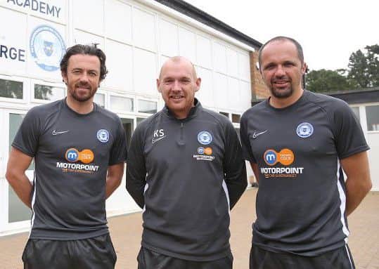 New Posh Academy Head Kieran Scarff (centre) with the club's under 18 management team of Matthew Etherington (right) and Simon Davies (left). Photo: Joe Dent/theposh.com.