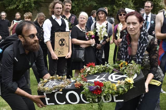 Extinction Rebellion funeral march in the city centre. EMN-190720-173825009