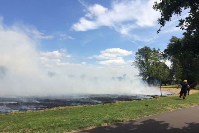 A firefighter at John Clare Park