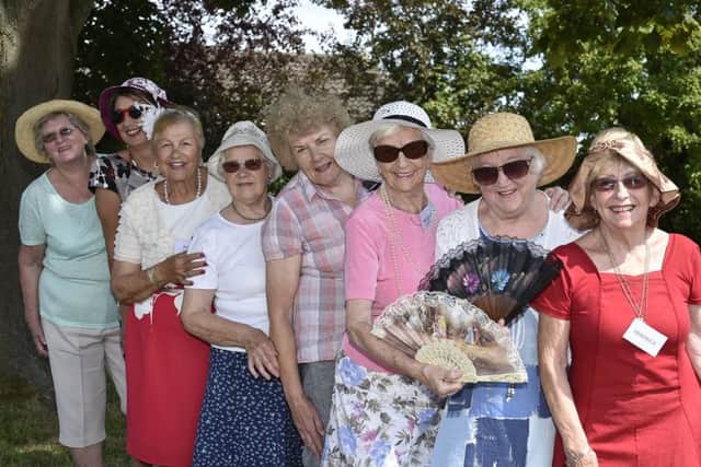 Members of the Netherton Friendship Club at St Andrew's United Reformed Church enjoy the hot weather