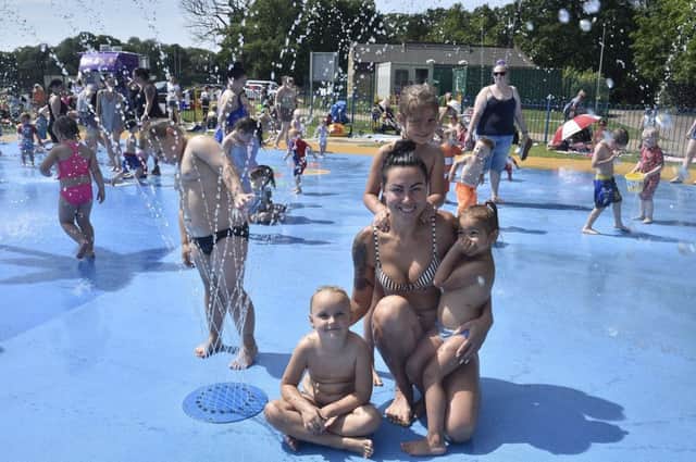 The Laura family cooling off in the hot weather at Bretton Water Park EMN-190723-134811009