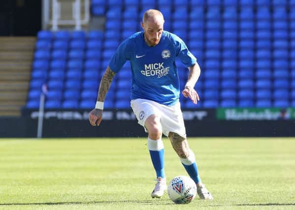 Marcus Maddison in action for Posh at Reading. Photo: Joe Dent/theposh.com.
