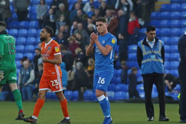 Mathew Stevens applauds the Posh fans after a game against Shrewsbury last season.