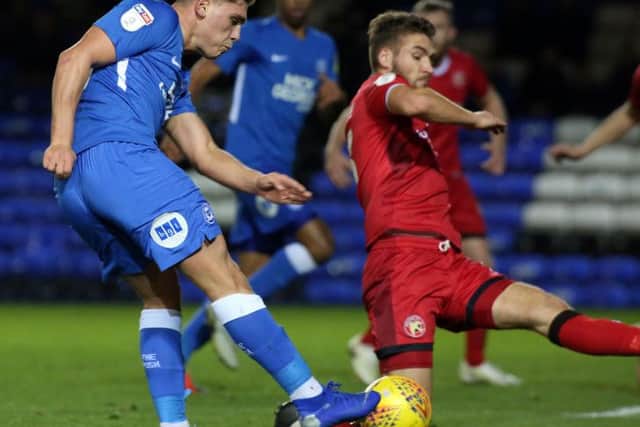 Matty Stevens in action for Posh against Walsall.