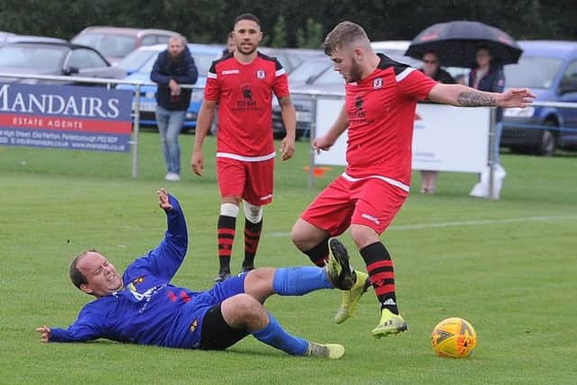 Action from Orton Rangers (red) v Parkside. Photo: David Lowndes.