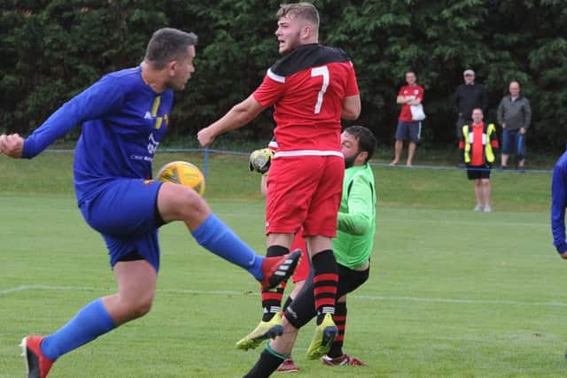 Action from Orton Rangers (red) v Parkside. Photo: David Lowndes.