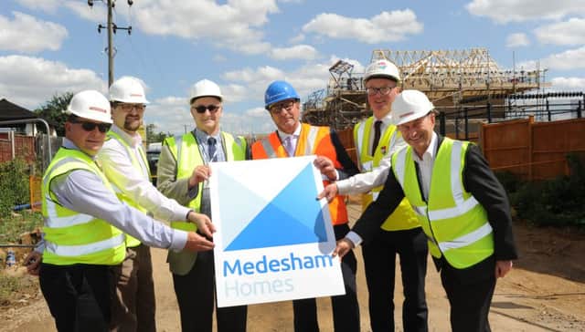 Roger Thompson, combined authority housing director, Howard Bright from Medesham Homes, Cllr John Holdich, Mayor James Palmer, Michael Heekin, Cross Keys Homes executive director of finance, and city councillor Steve Allen at the Crowland Road site