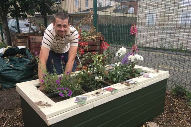 Dave Poulton with a garden planter