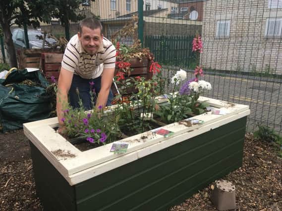 Dave Poulton with a garden planter