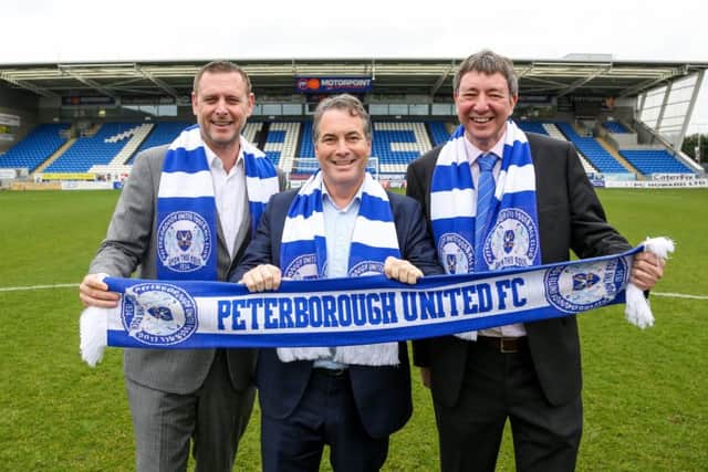 Peterborough United's co-owners, from left, Darragh MacAnthony, Stewart 'Randy' Thompson, and Dr Jason Neale.