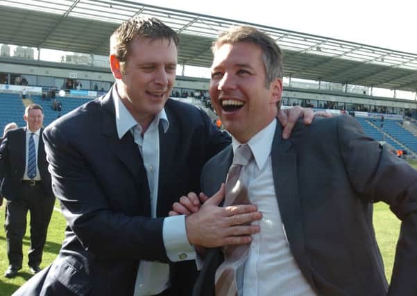 Posh boss Darren Ferguson (right) celebrates promotion to the Championship with chairman Darragh MacAnthony in 2009.