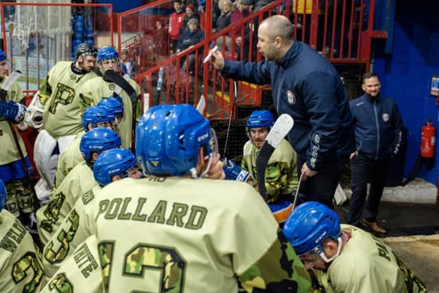 Phantoms coach Slava Koulikov addresses his players.
