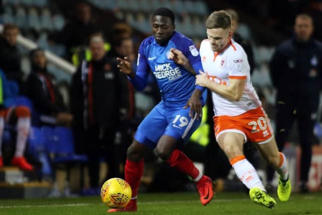 Idris Kanu (left) qualifies as a homegrown Posh player this season.