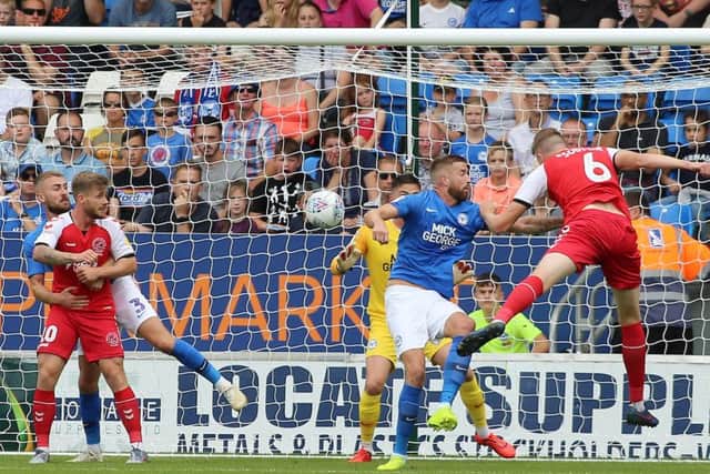 Harry Souttar heads Fleetwood in front at Posh in the fourth minute. Photo: Joe Dent/theposh.com.