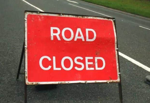 Road closed sign