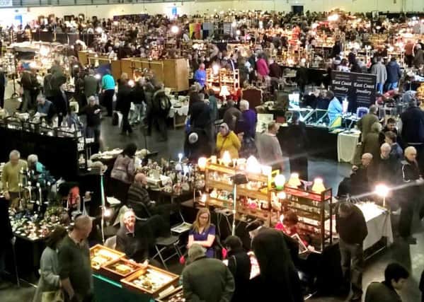 Visitors to a Peterborough Festival of Antiques.
