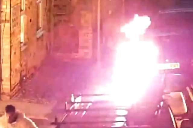 Michal Gregor setting fire to the car. Photo: Cambridgeshire police