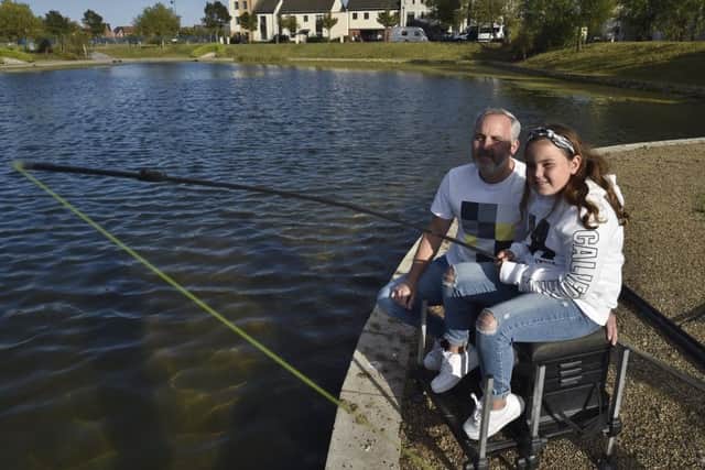 Lola Eldridge with her dad Mark. EMN-190918-003330009