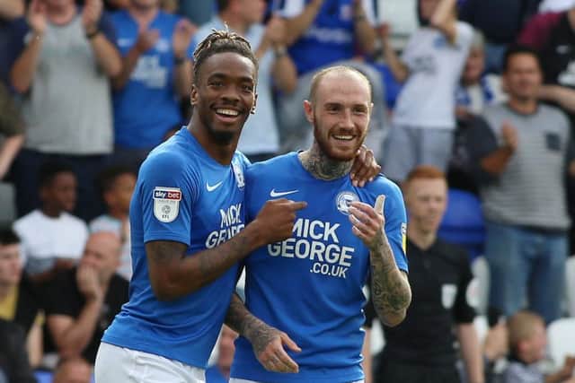 Posh striker Ivan Toney celebrates his second goal against Rochdale with Marcus Maddison. Photo: Joe Dent/theposh.com.
