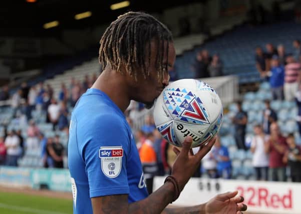 Hat-trick hero Ivan Toney with the matchball after the game.