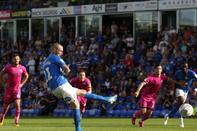 Marcus Maddison converts a penalty for Posh against Rochdale. Photo: Joe Dent/theposh.com.