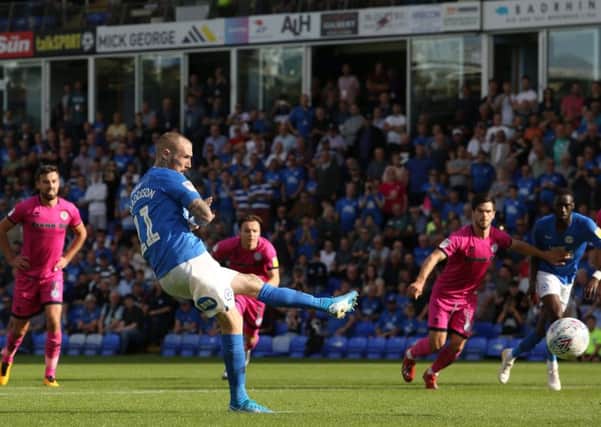 Marcus Maddison converts a penalty for Posh against Rochdale. Photo: Joe Dent/theposh.com.