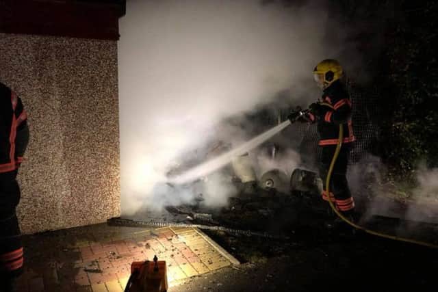 Firefighters putting out the flames. Photo: Cambridgeshire Fire and Rescue Service