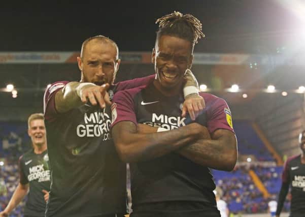 Ivan Toney poses for the camera with Marcus Maddison after his goal at Tranmere. Photo: Joe Dent/theposh.com.