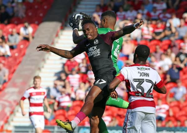 Ivan Toney in action for Posh at Doncaster.