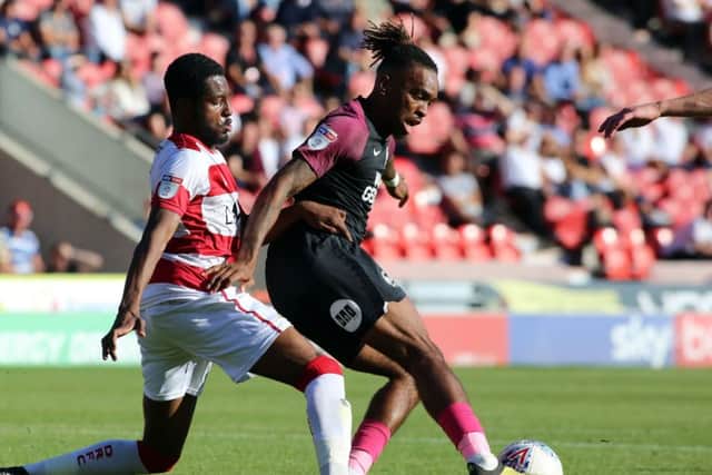 Ivan Toney of Peterborough United in action against Doncaster Rovers. Photo: Joe Dent/theposh.com.