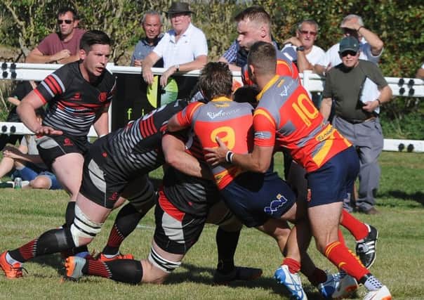 Action from Oundle (darker shirts) v Borough. Photo: David Lowndes.