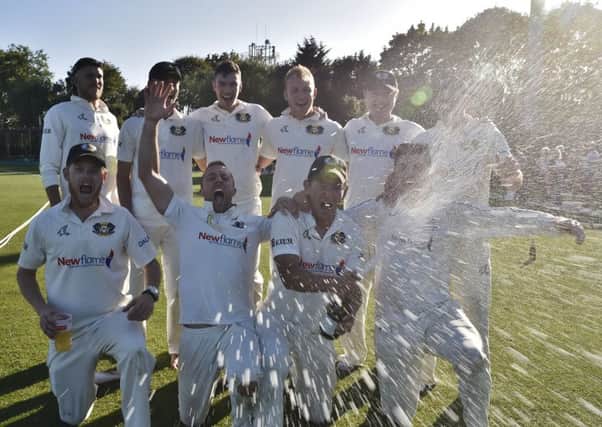Peterborough Town Cricket Club celebrate their Northanats Premier Division title. Photo: David Lowndes.