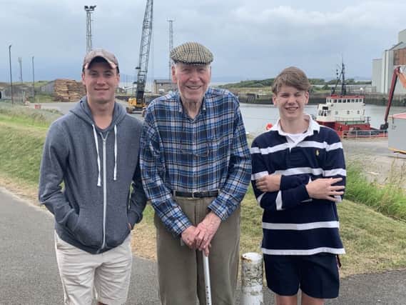 Former Peterborough Evening Telegraph editor, Norman Carroll, who has died aged 78, pictured earlier this year with grandchildren Oliver and Tom EMN-190923-171012001