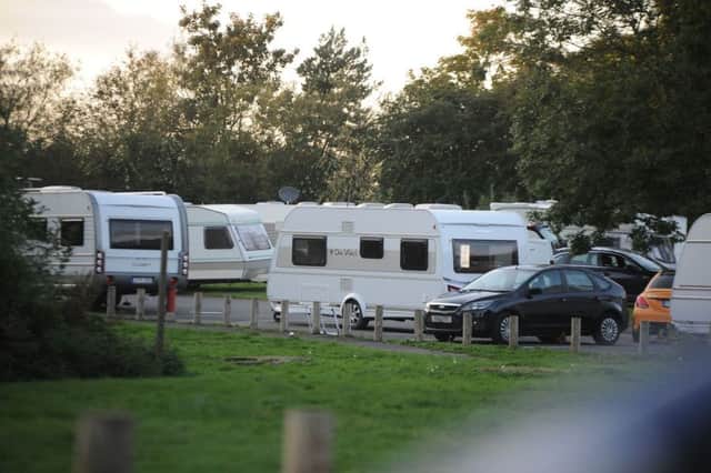 Travellers at the car park