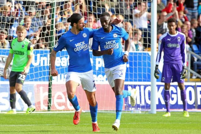 Mo Eisa (right) and George Boyd celebrate the second Posh goal. Photo: Joe Dent/theposh.com.