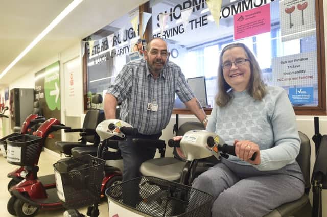 Shopmobility volunteers Roy Harris and Molly Wright at Queensgate EMN-190928-181517009