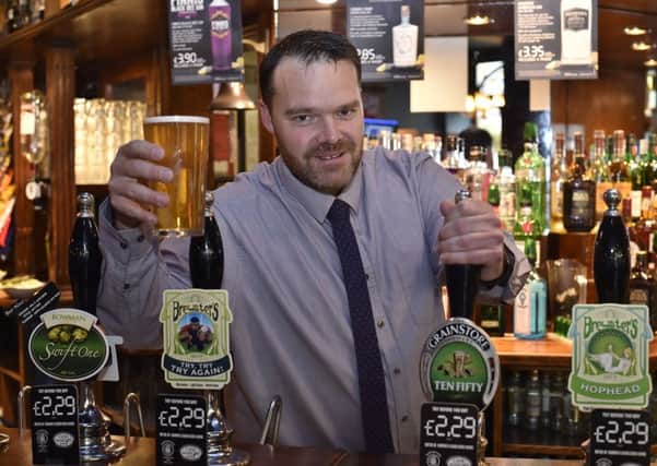 Draper's Arms, Cowgate manager Chris Parkes promoting  the forthcoming 40th anniversary real ale beer festival EMN-190110-172411009