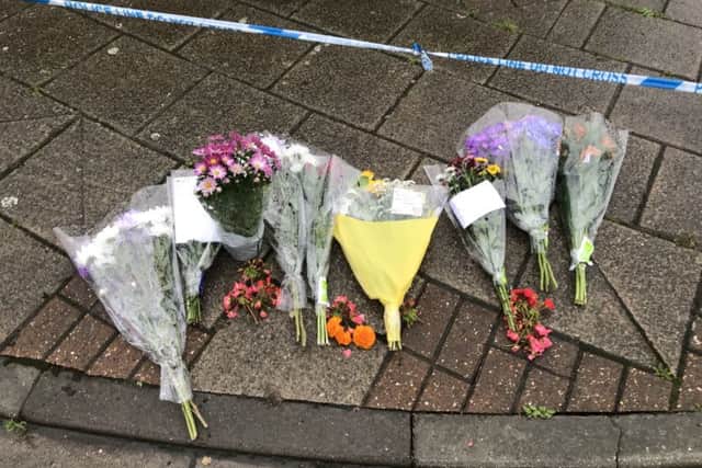 Floral tributes. Photo: Sam Russell/PA Wire
