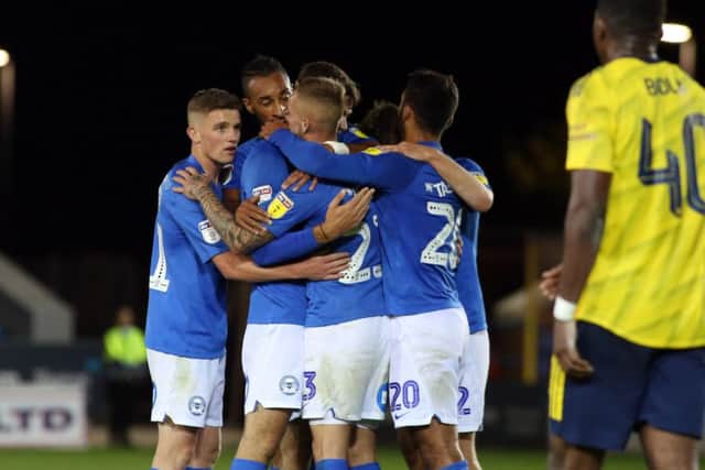 Posh players celebrate Joe Ward's winning goal. Photo: Joe Dent/theposh.com.