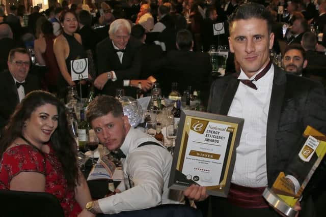 ImpraGas founder Joseph Valente with the award and his team at the awards presentation.