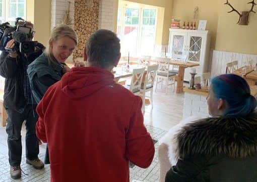 A TV crew filming at House of Feasts today. Photo: Damian Wawrzyniak