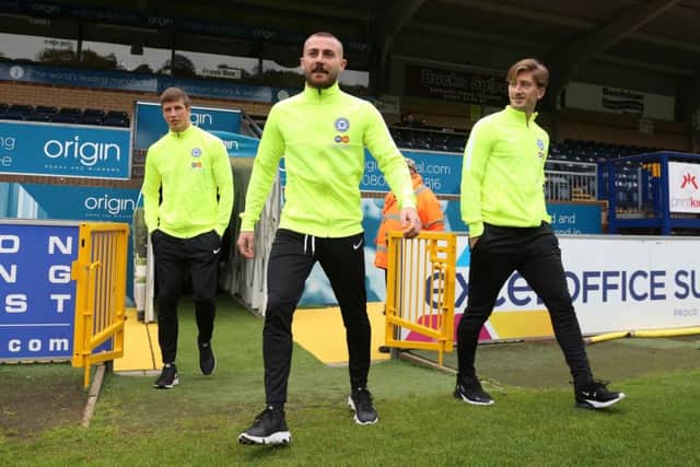Posh players before the game at Wycombe. Photo: Joe Dent/theposh.com.