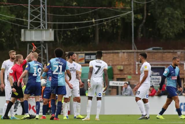 Curtis Thompson of Wycombe Wanderers is sent off by referee Will Finnie. Photo: Joe Dent/theposh.com.