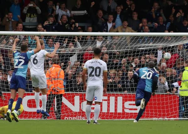 Adebayo Akinfenwa of Wycombe Wanderers scores the equalising goal from the penalty spot. Photo: Joe Dent/theposh.com
