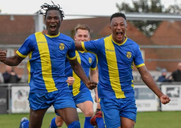 Maniche Sani (lef) celebrates his winning goal for Peterborough Sports against Guiseley. Photo: James Richardson.