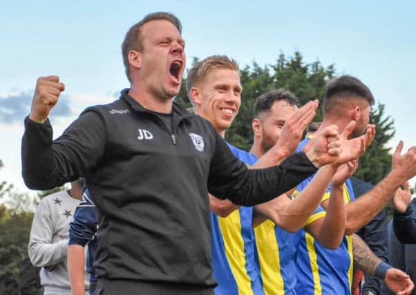 Peterborough Sports boss Jimmy Dean celebrates after the FA Cup win over Guiseley. Photo: James Richardson.