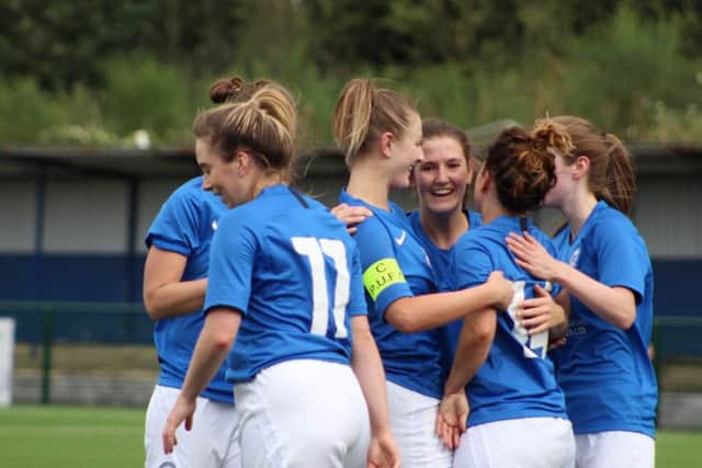 Posh celebrate a goal for Donna McGuigan (14) against Stevenage. Photo: Gary Reed.