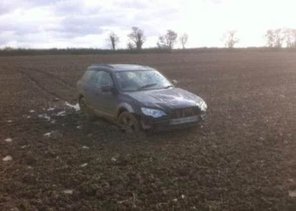 The Subaru which became stuck in a Leicestershire field