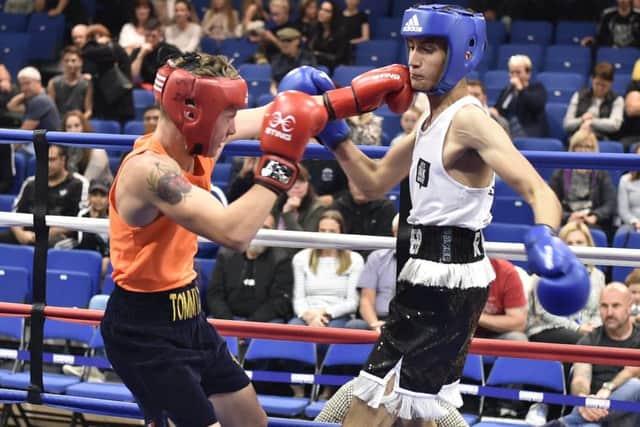 Ali Raja from Peterborough Police ABC (blue)  v Thomas Petchall from Albion Boxing Academy. Photo: David Lowndes.